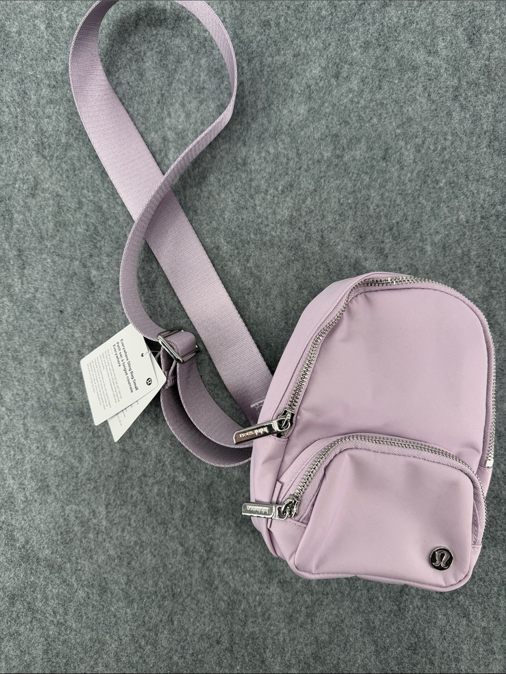 Lululemon Everywhere sling backpack bag purse lilac purple NWT